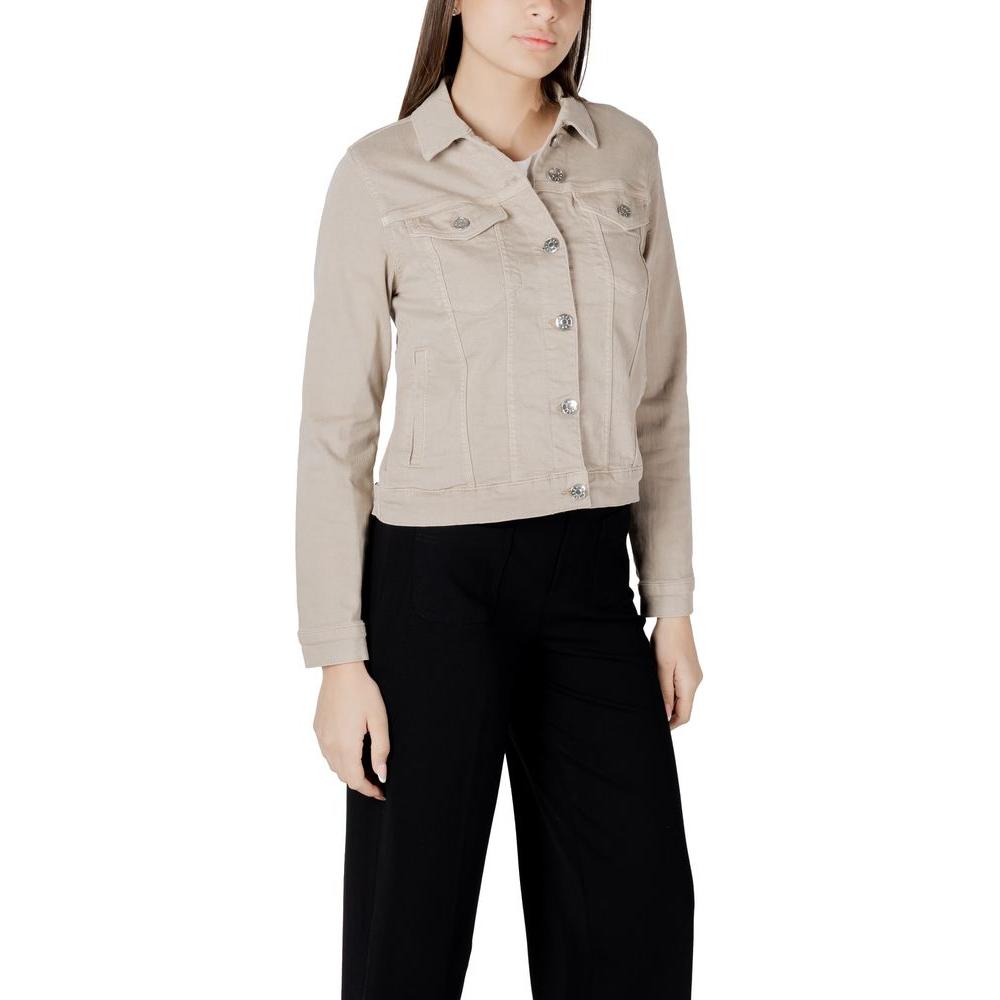 Woman wearing a Street One beige cotton jacket with metallic buttons and front pockets, perfect for casual styles.