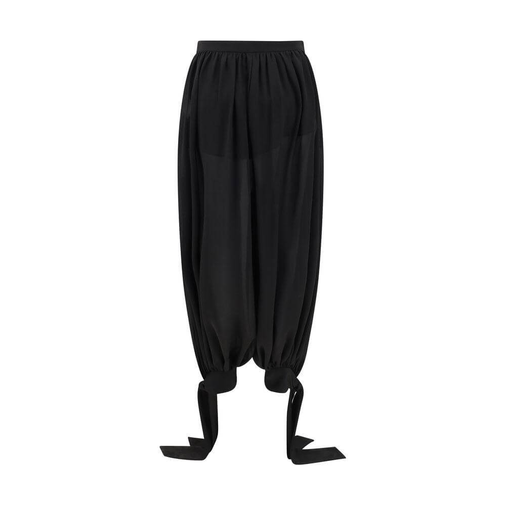 Chloé Silk Pants featuring a wide Arabian-style pattern with adjustable cinched hems and side zipper closure for a sleek silhouette.
