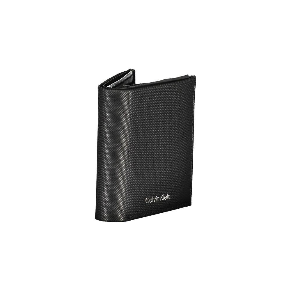 Calvin Klein sleek black leather bi-fold wallet with RFID block, featuring card slots and coin purse.