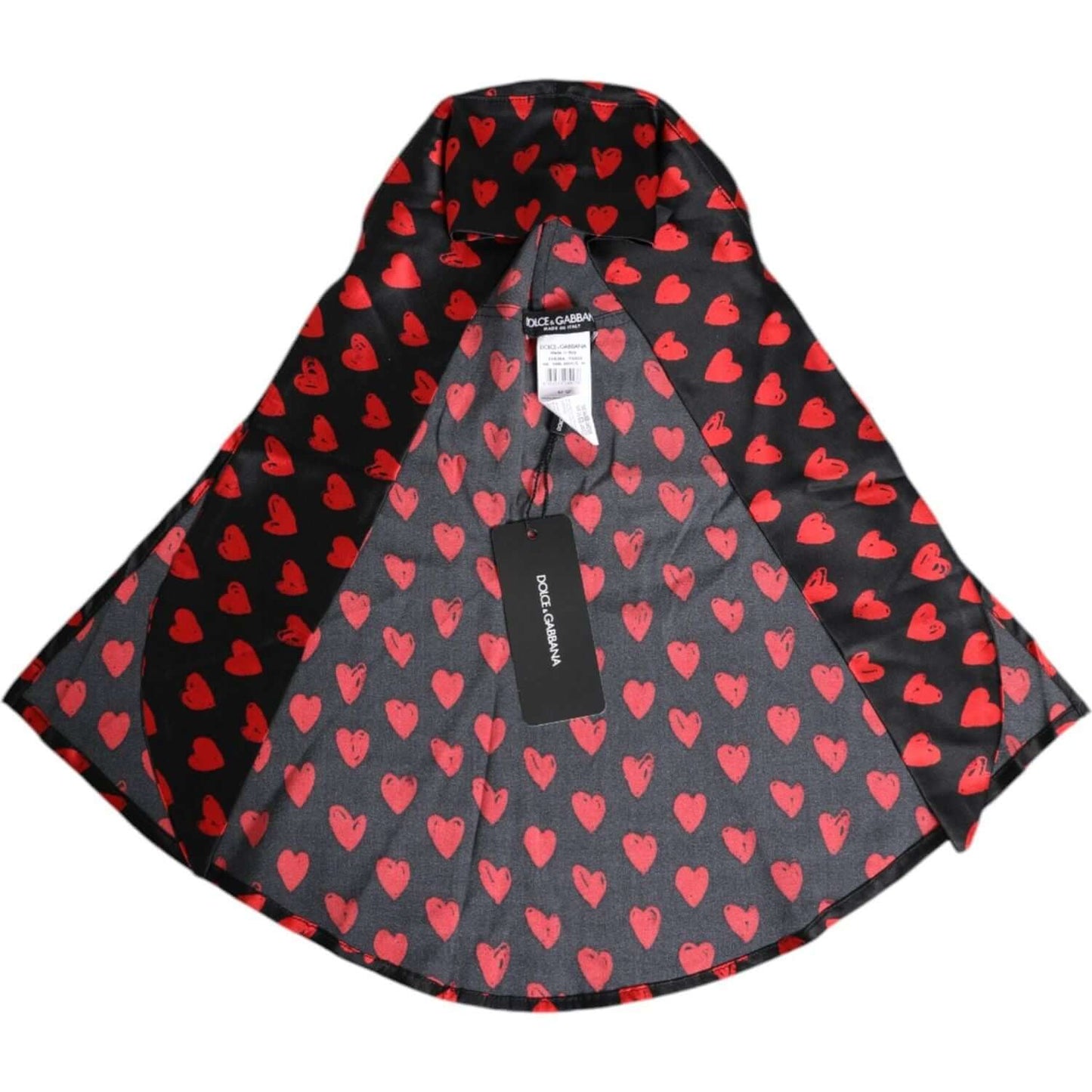 Dolce & Gabbana black sun hat with red hearts pattern, made of 100% polyester, showcasing brand tag and logo details. Made in Italy.