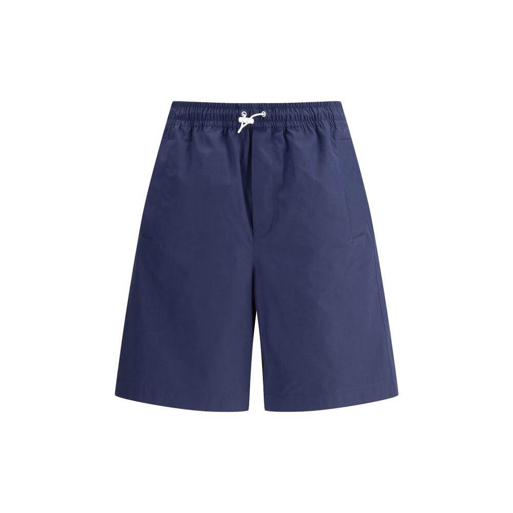 Gucci Logoed Shorts in navy cotton with elastic waistband, adjustable drawstring, side welt pockets, and iconic monogram detail.