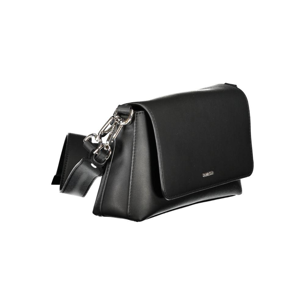Calvin Klein black polyester handbag with adjustable strap, snap closure, and logo. Features internal card pockets. Eco-friendly design.