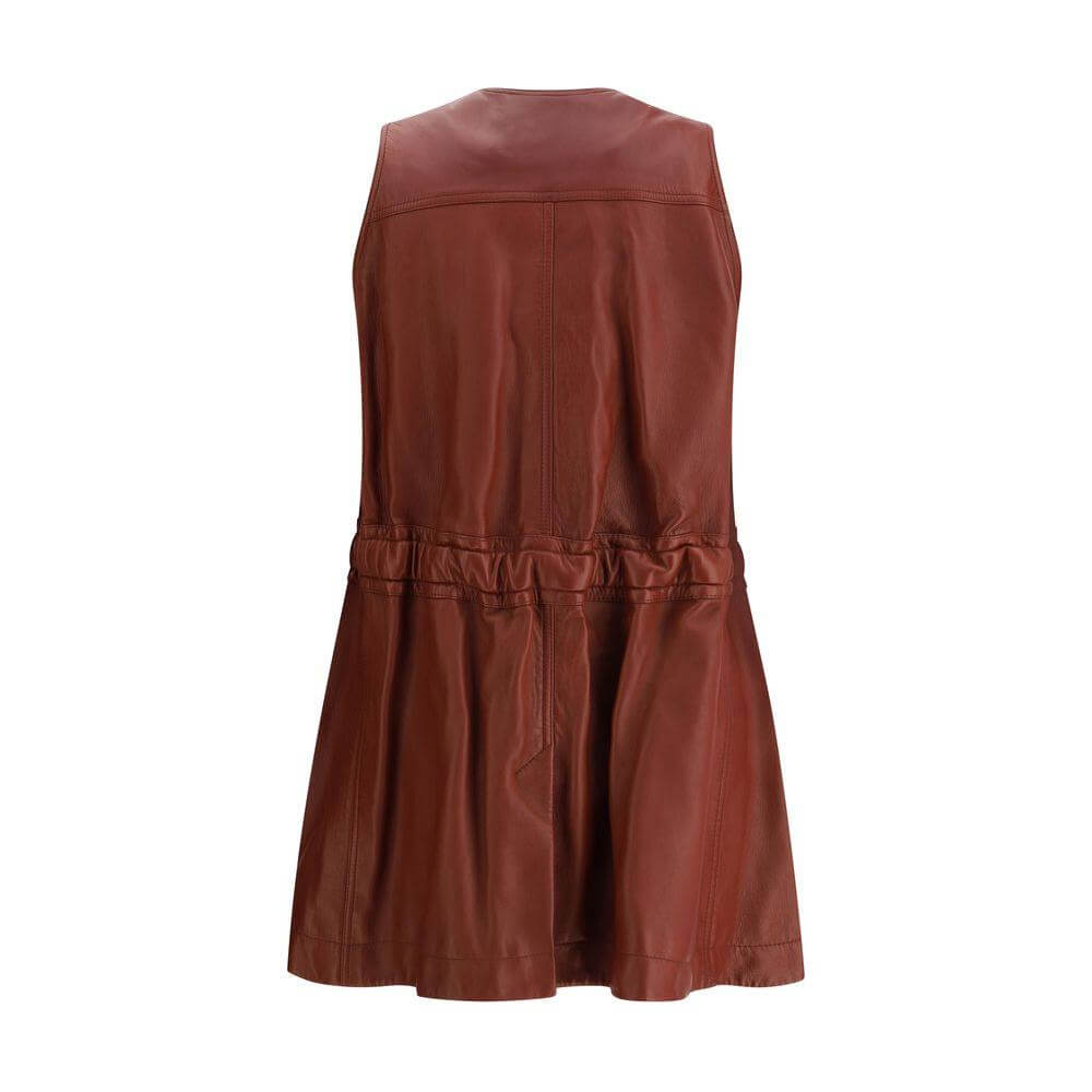 Back view of Chloé leather vest with tailored details and soft leather construction, featuring a refined metal logo and flap pockets.