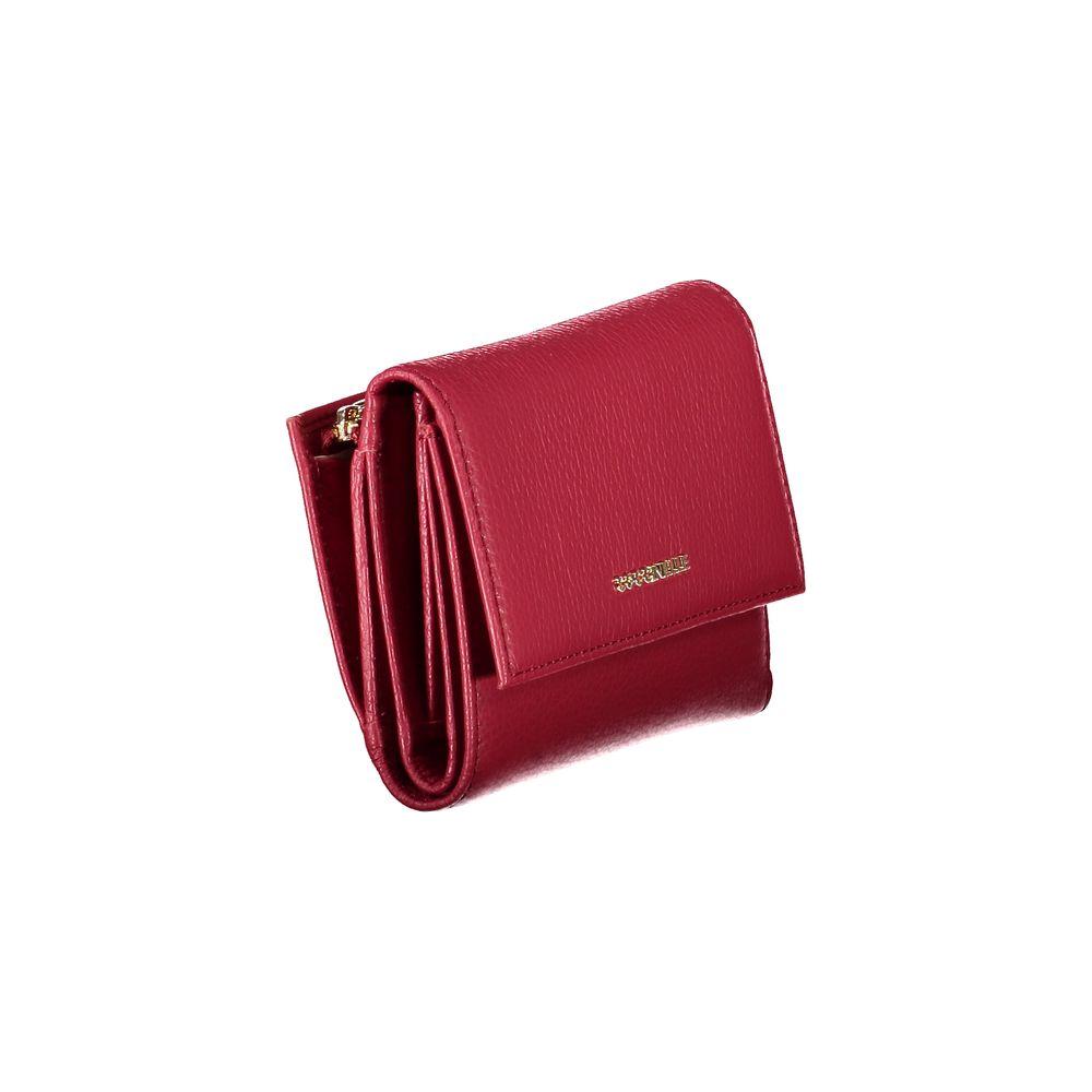 Coccinelle red leather women's wallet with automatic closure, featuring three compartments and an external coin pocket for elegant storage.