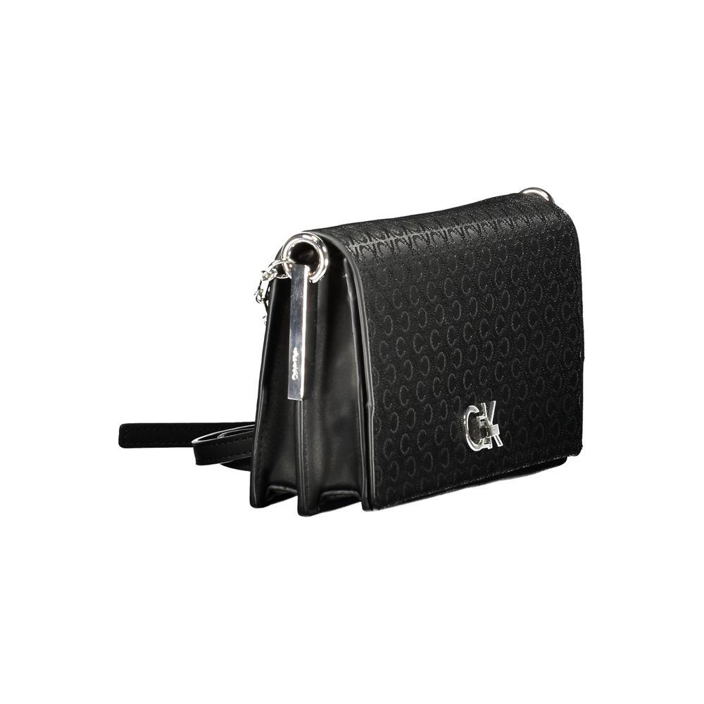 Calvin Klein black polyester women handbag with elegant CK logo, two compartments, and stylish twist closure. Eco-friendly design.