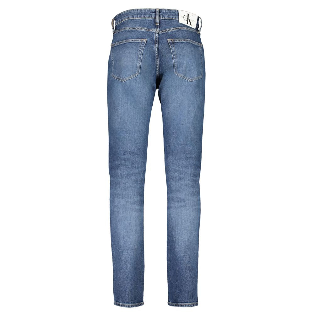 Calvin Klein blue dad jeans with authentic washed effect, 5 pockets, button and zip closure, featuring 20% recycled cotton.