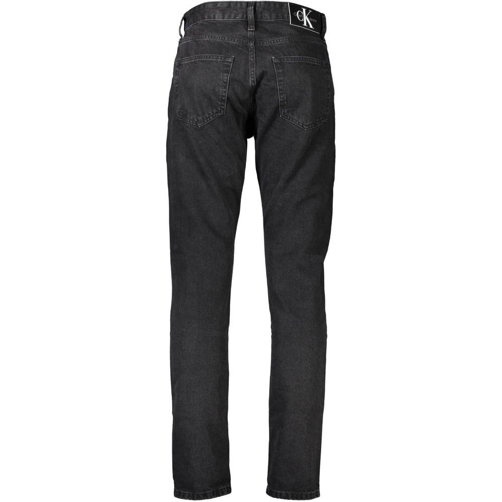 Back view of Calvin Klein black cotton jeans featuring 5-pocket design, button and zip closure, contrast detailing, and logo application.