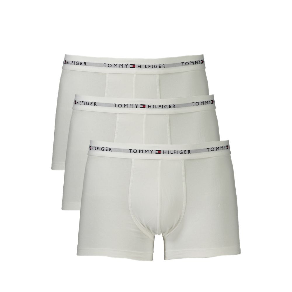 Tri-pack of Tommy Hilfiger white cotton men’s boxer briefs with elastic waistband and logo.