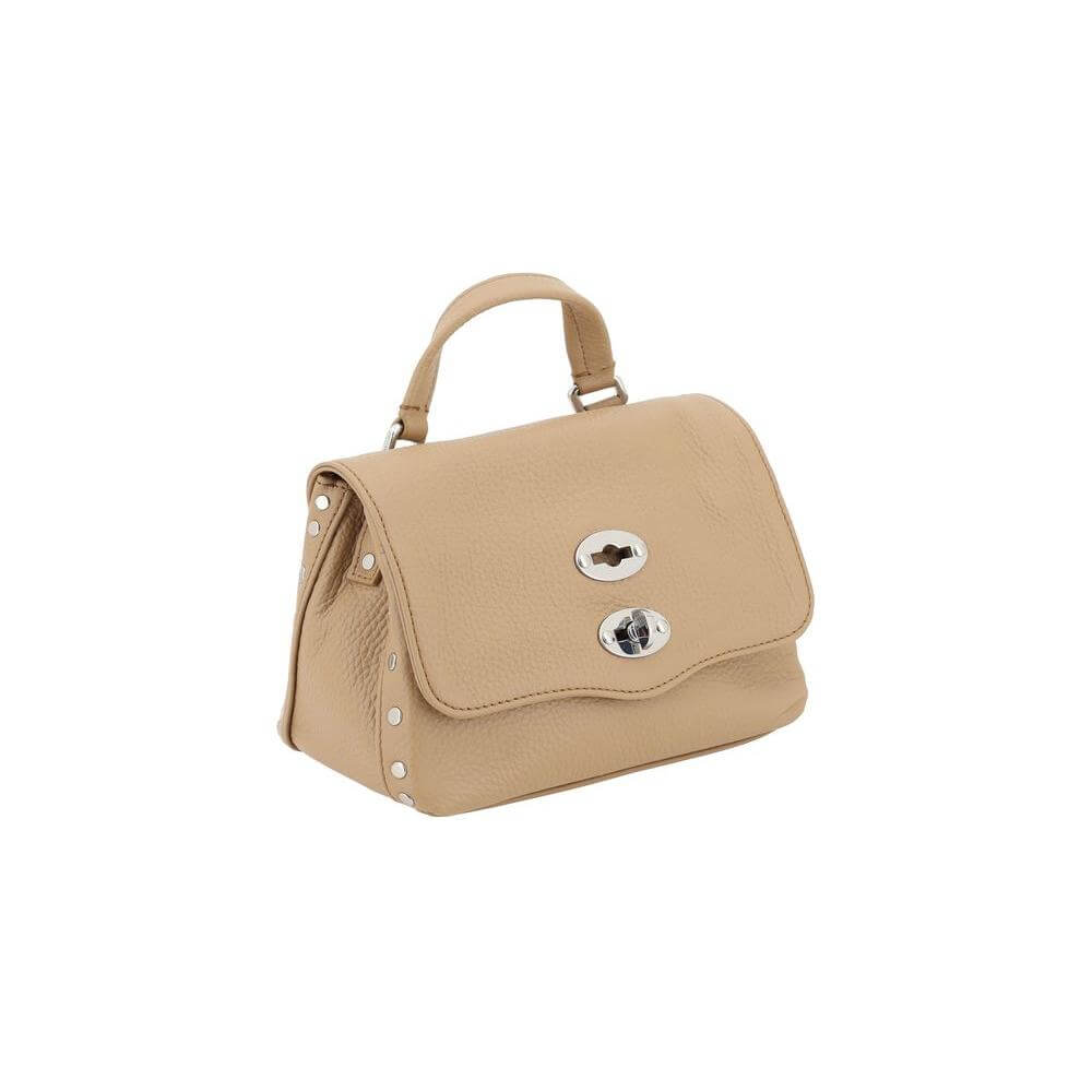 Zanellato Postina Daily Shoulder Bag in calfskin with hook-and-eye closure, short handle, adjustable strap, and studded trim.