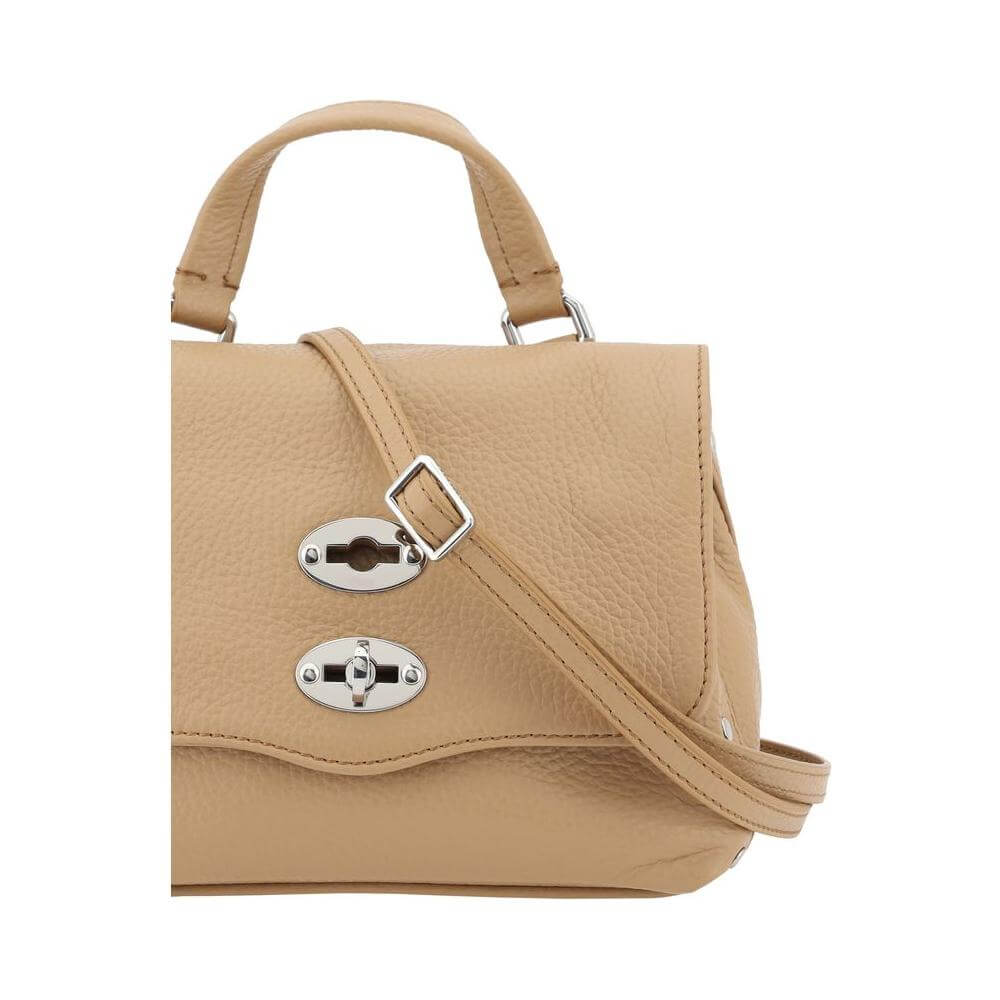 Zanellato Postina Daily Shoulder Bag in calfskin with grained leather design, front hook-and-eye closure, and adjustable strap.