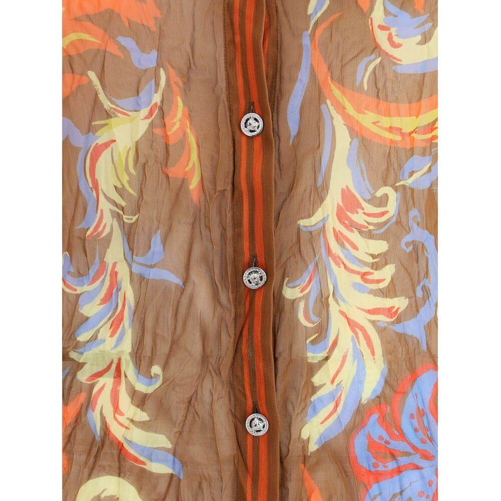 Close-up of Versace Barocco Silk Crepe Shirt with exotic pattern and button detail, showcasing vibrant colors and elegant design.