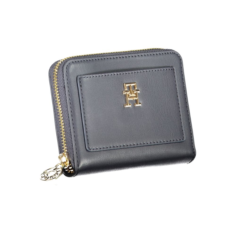 Tommy Hilfiger Blue Polyethylene Wallet with logo, zip closure, coin purse, and external pocket, ideal for cards and cash management.
