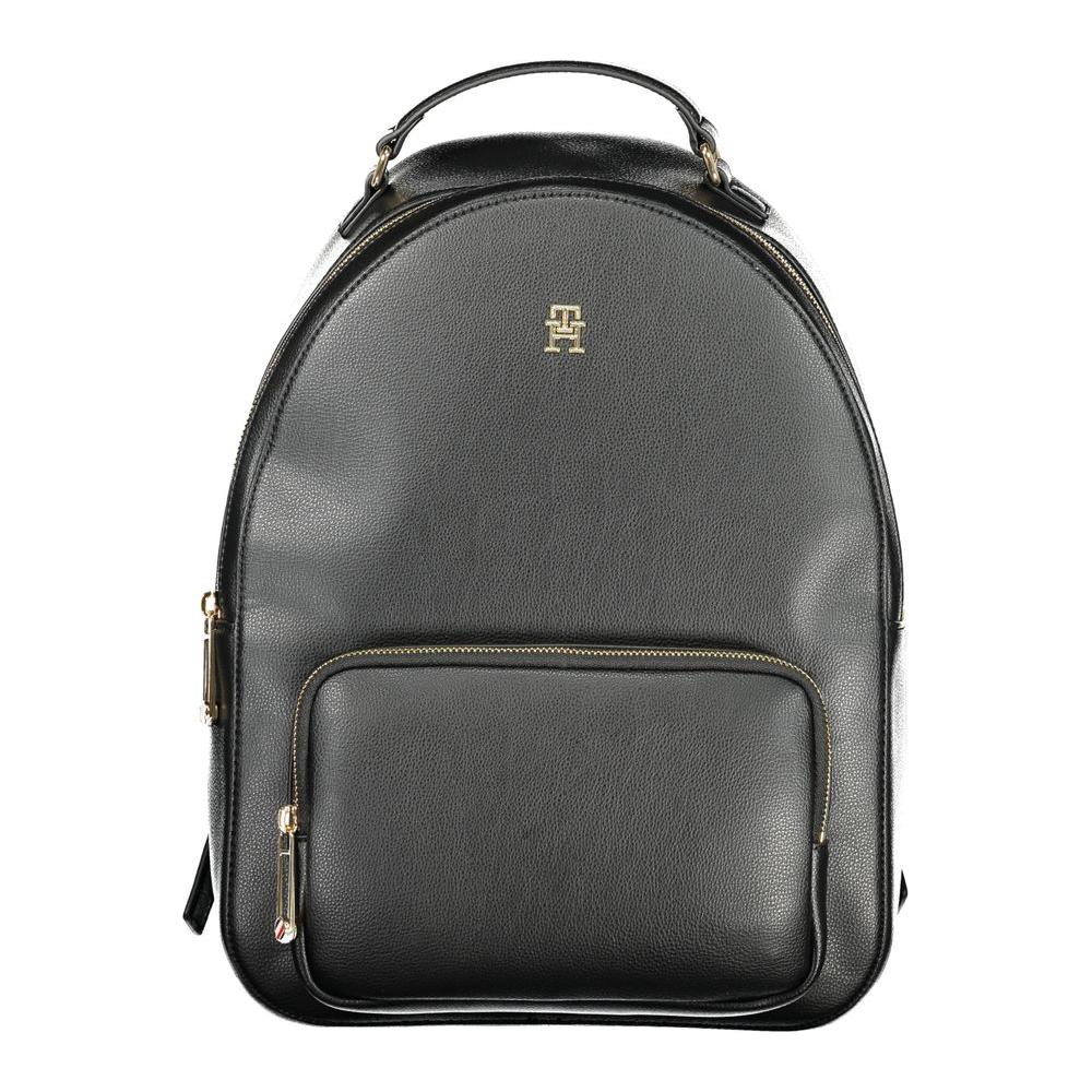 Tommy Hilfiger black polyethylene women's backpack with gold logo, front pocket, and sleek design for modern style.