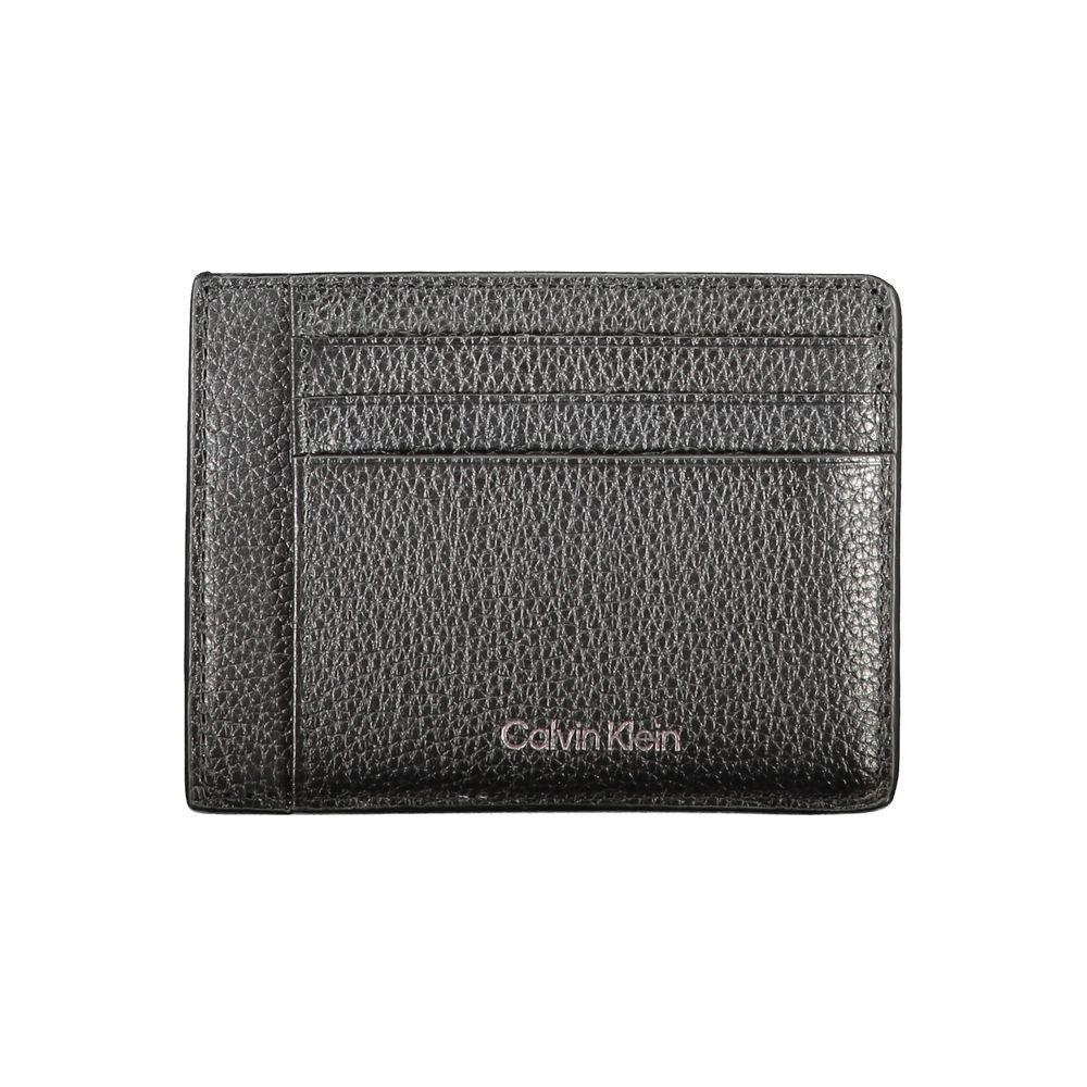 Calvin Klein black leather wallet with logo, two compartments, coin purse, and card slots showcasing sleek and elegant design.