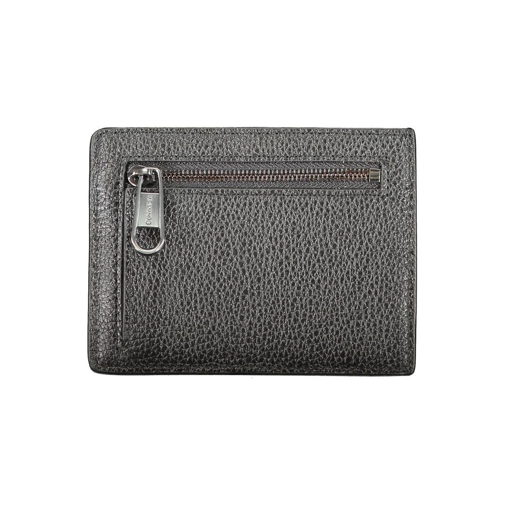 Calvin Klein black leather wallet with zip pocket, 2 compartments, coin purse, card slots, and logo design.