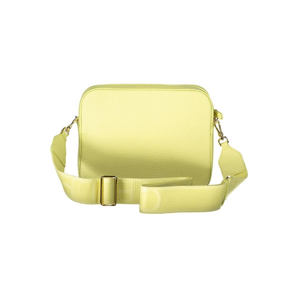 Coccinelle yellow leather handbag with adjustable shoulder strap, external and internal pockets, zip closure, and logo detail.
