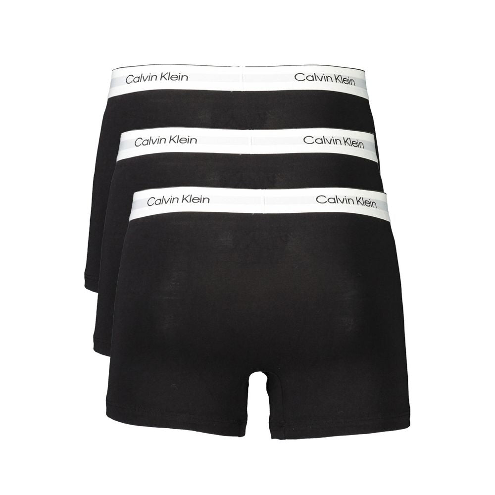 Calvin Klein black cotton men's boxer briefs tri-pack with logo waistband, eco-friendly, sustainable fashion.