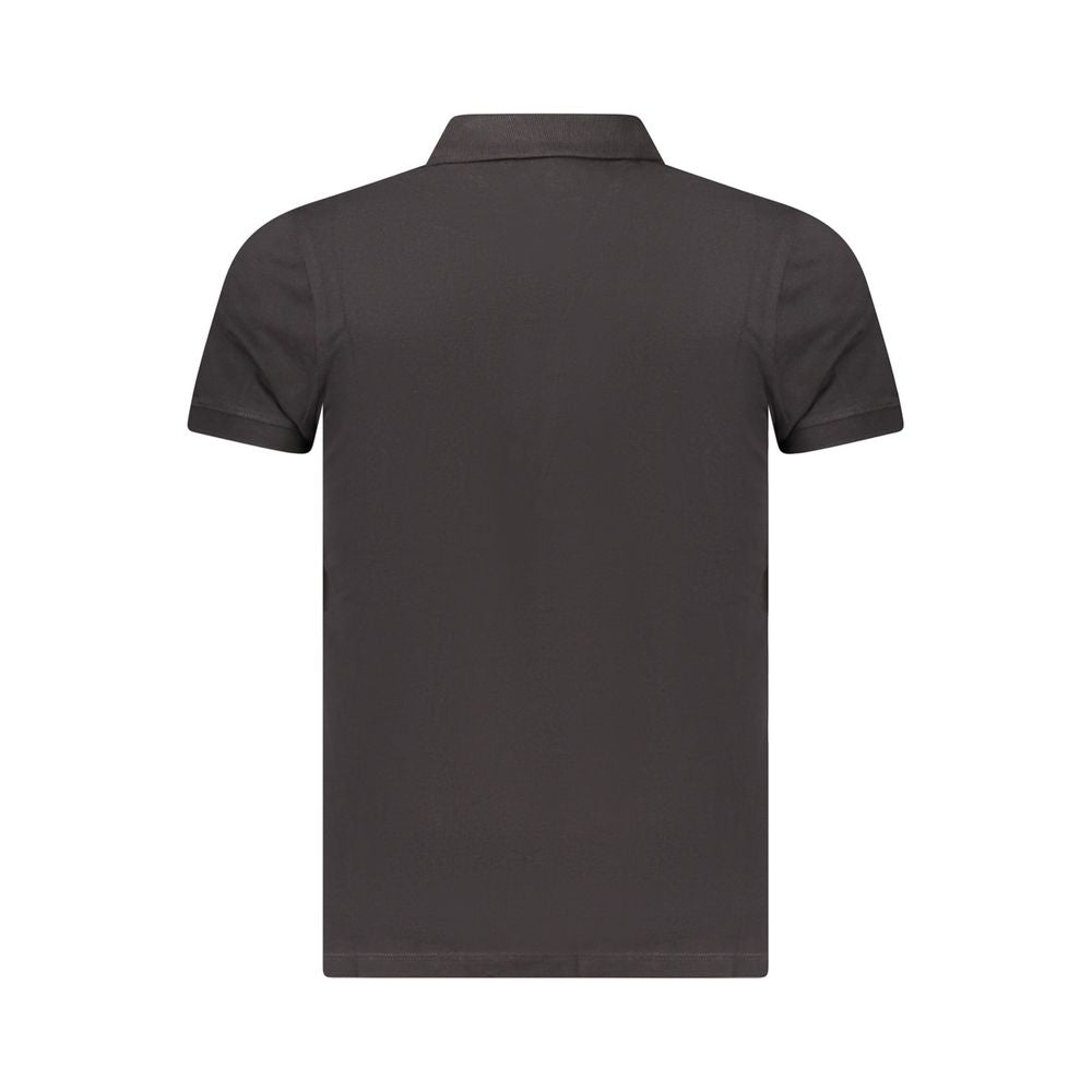 Back view of Tommy Hilfiger black cotton polo shirt for men, featuring a sleek design with short sleeves and classic collar.
