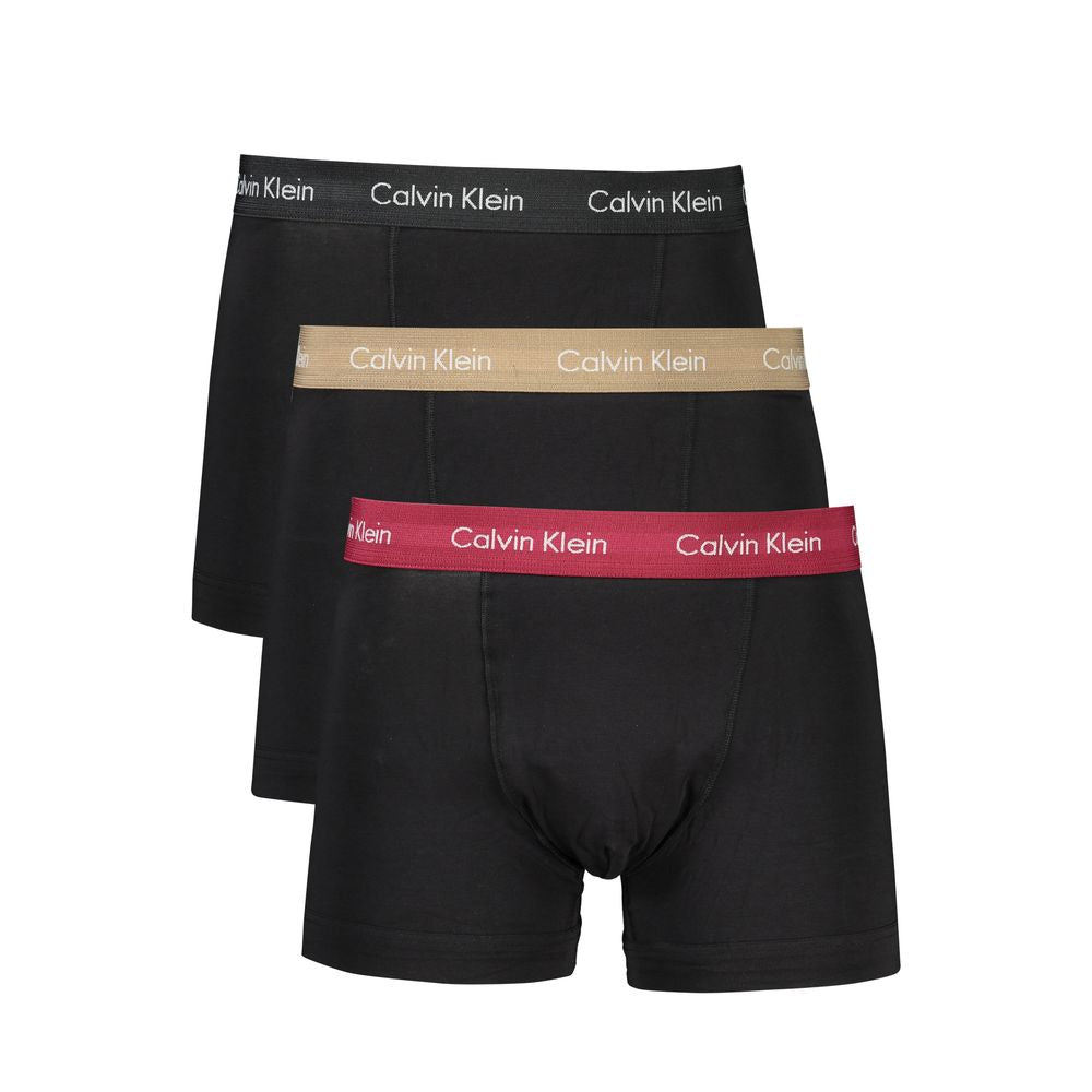 Calvin Klein black cotton underwear tri-pack with beige, black, and bordeaux elastic waistband. Features logo on waistband.