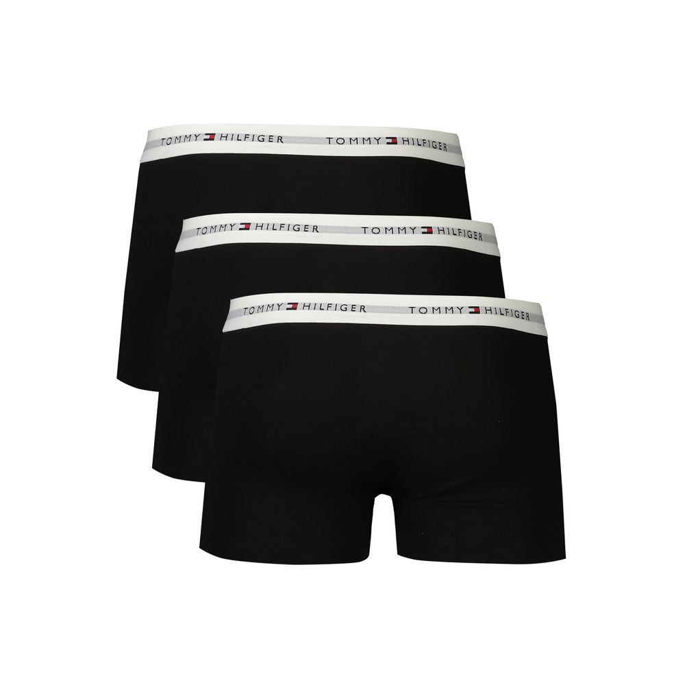 Tommy Hilfiger black boxer briefs trio with logo waistband, cotton blend for comfort and style, ideal for trendsetting men.