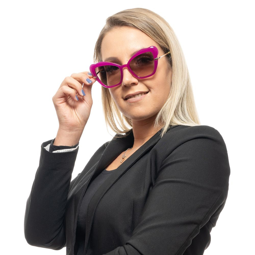 Woman wearing Emilio Pucci Purple Plastic Sunglasses with butterfly-style full-rim frame, brown gradient lenses, offering 100% UVA & UVB protection.