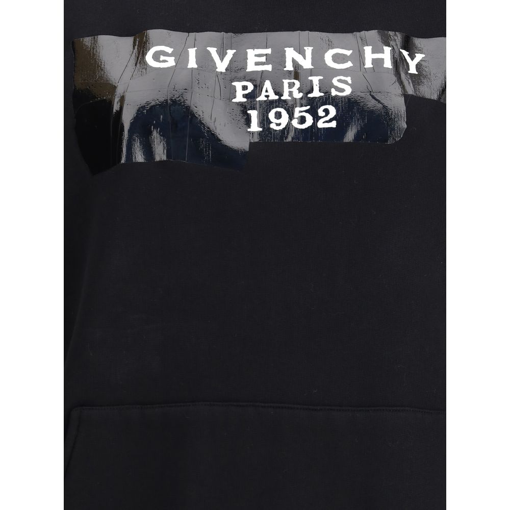 Givenchy Black Cotton Sweatshirt with 3D print detail and pouch pocket, featuring ribbed hem and cuffs for an oversized modern look.