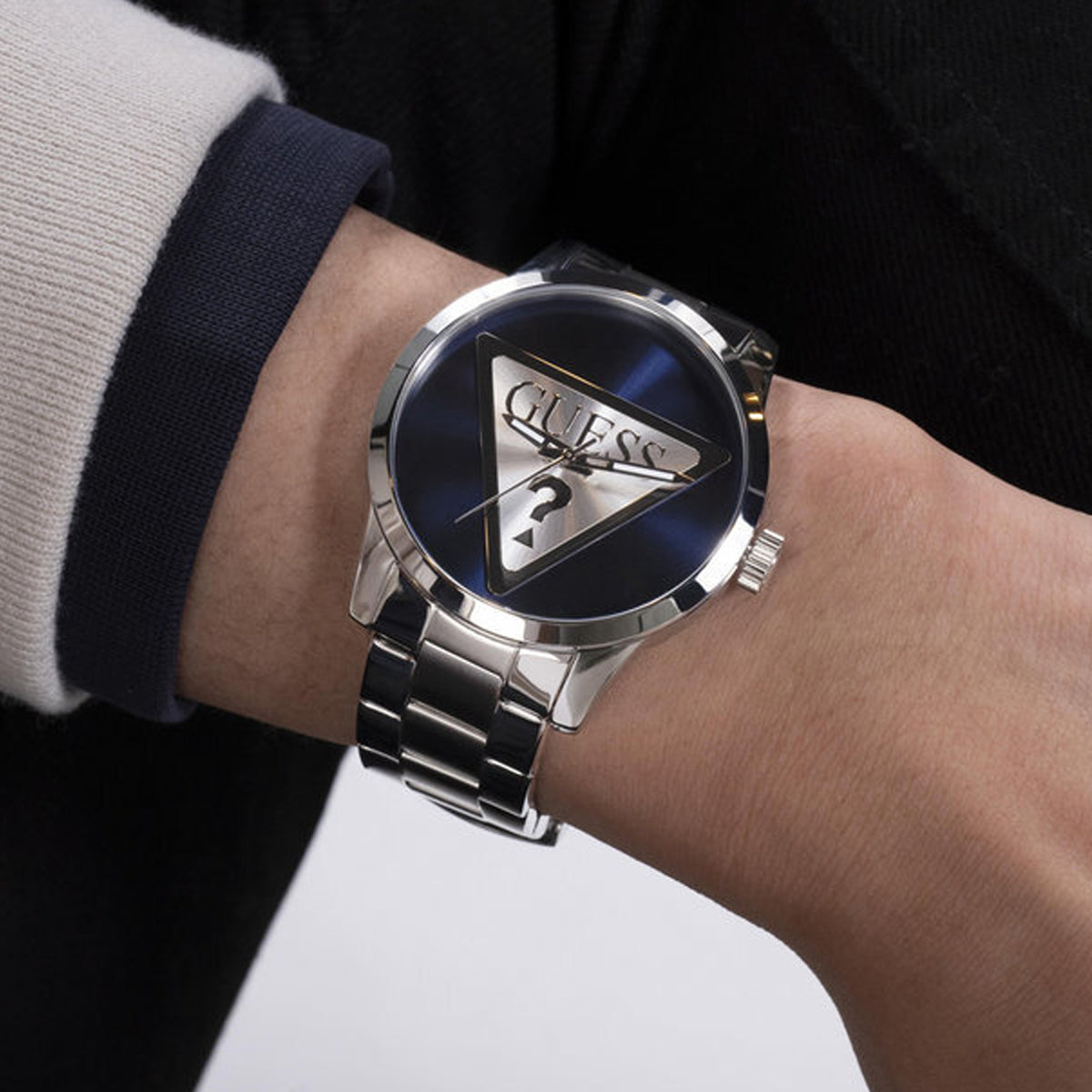 GUESS Mod. BADGE wristwatch with gold buckle and black strap, showcasing sleek design and modern elegance for fashion-savvy individuals.