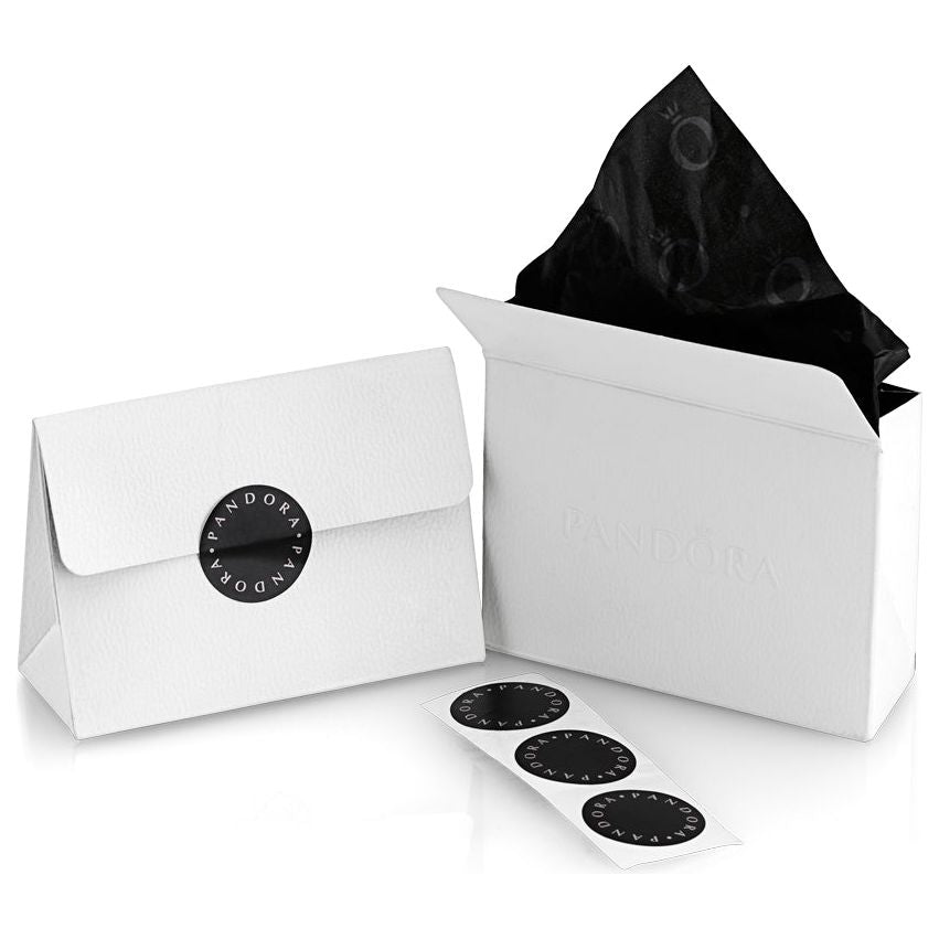 PANDORA jewelry gift packaging with branded black tissue paper and stickers, showcasing elegant white boxes for luxury accessories.