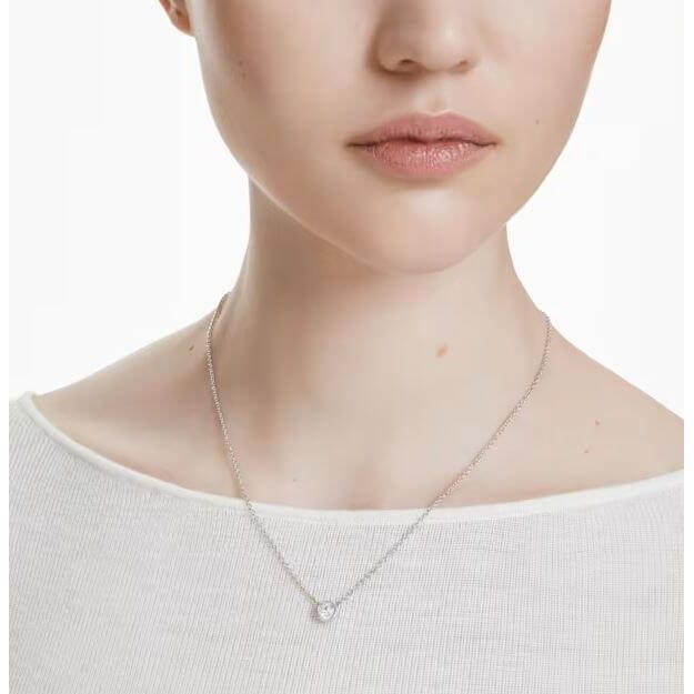 SWAROVSKI Mod. 5696039 Imber Rhodium Plated Necklace on model, round-cut stone, minimalist design