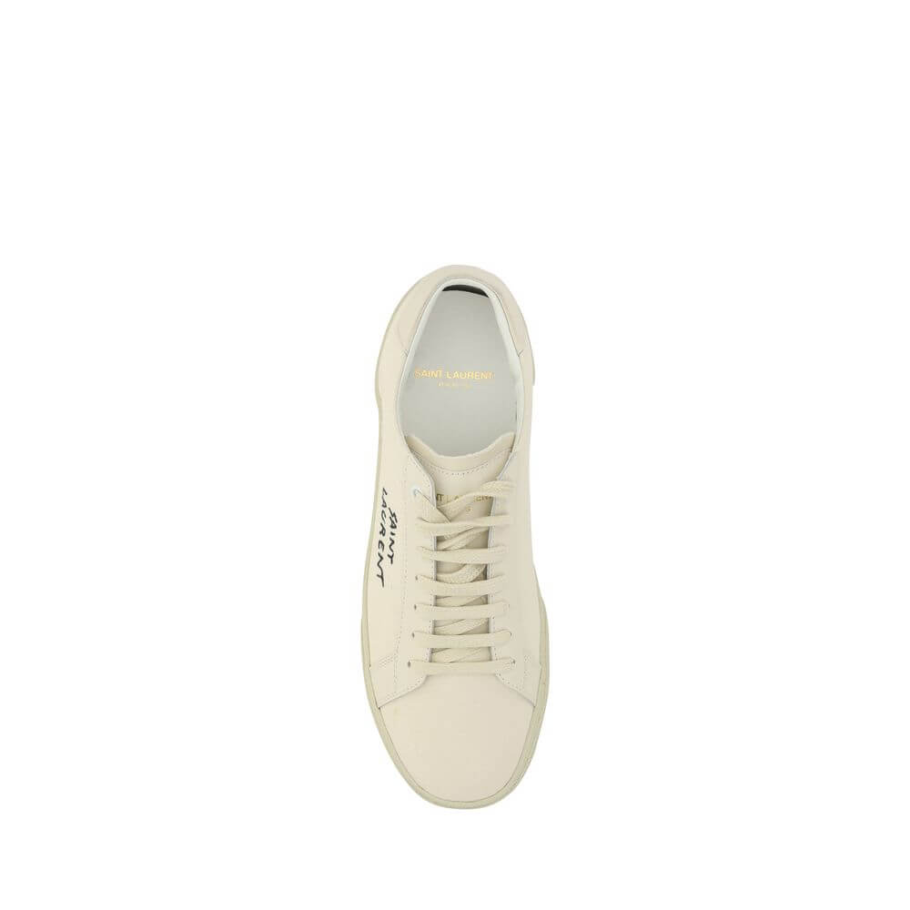 Top view of Saint Laurent White Rubber Low Top Sneakers with lace-up design and embroidered brand signature on side.
