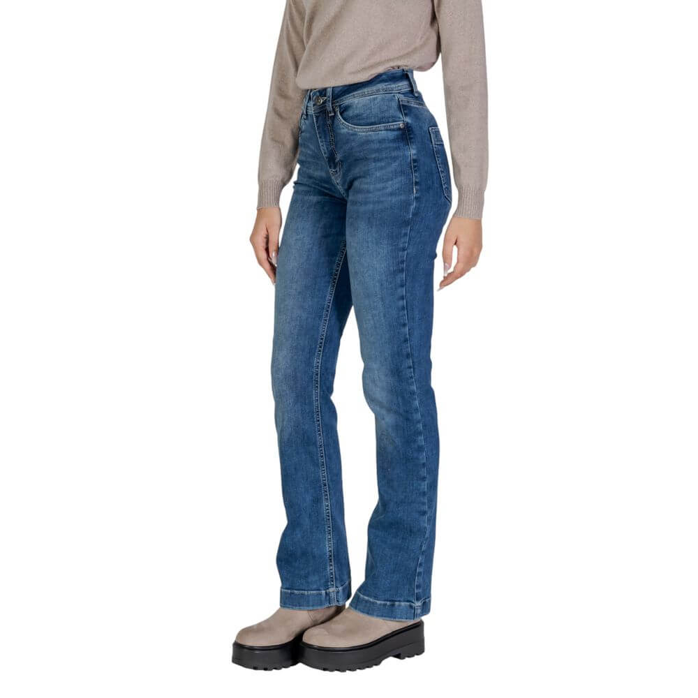 Woman wearing Street One Blue Cotton Mom Jeans with double button and zip closure, showing modern style and comfortable fit.