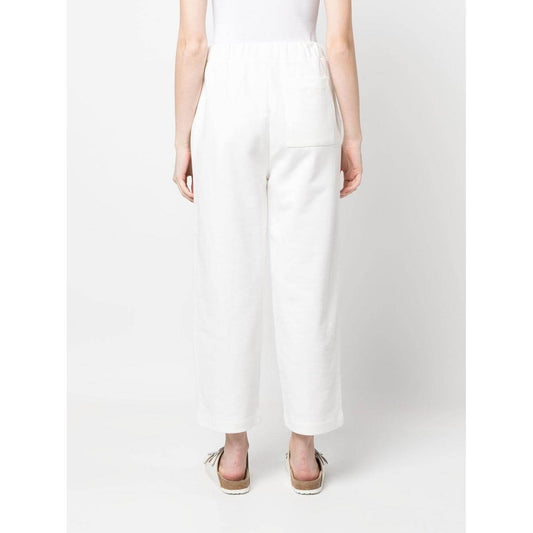 Back view of Joshua Sanders white cotton trousers with elastic waist and wide-leg design, featuring slip pockets.