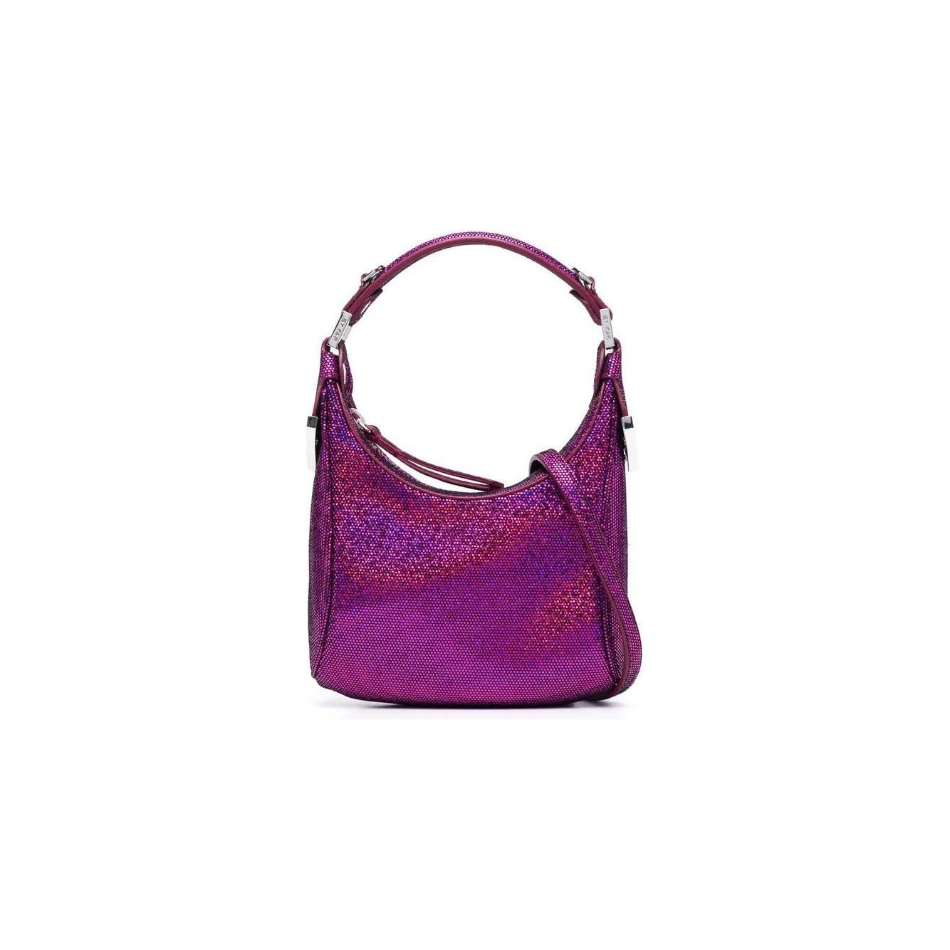 Front view with bag zipped and handles upright.