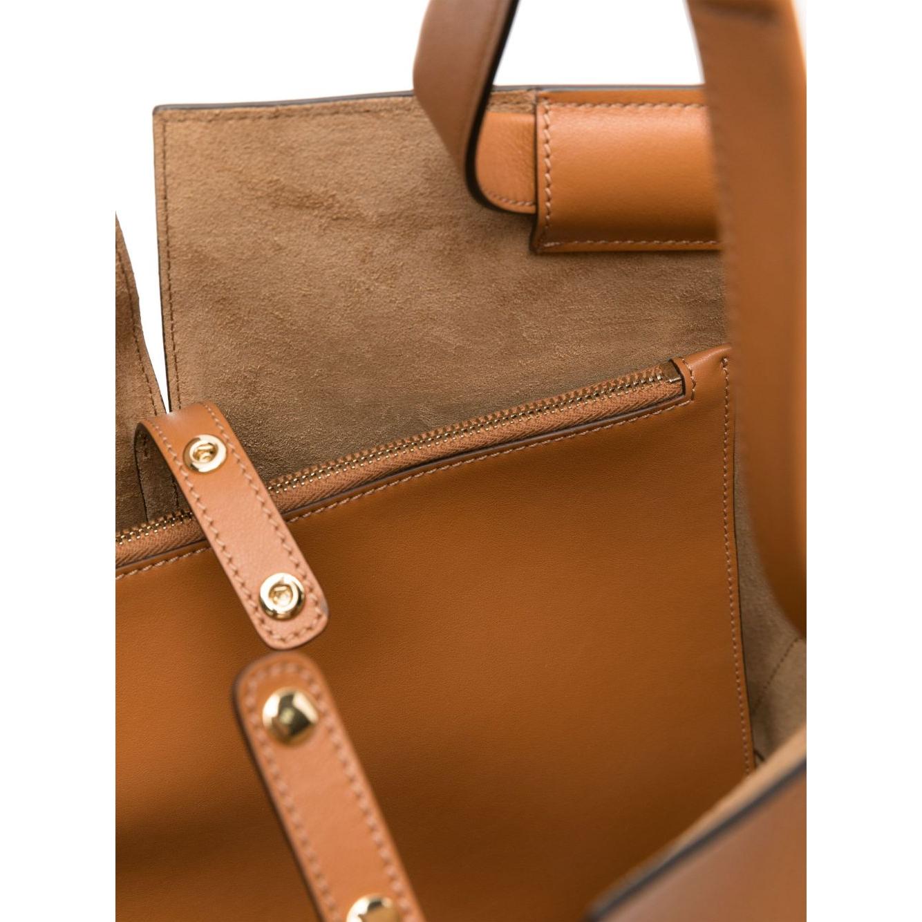 Front view with bag zipped and handles upright.