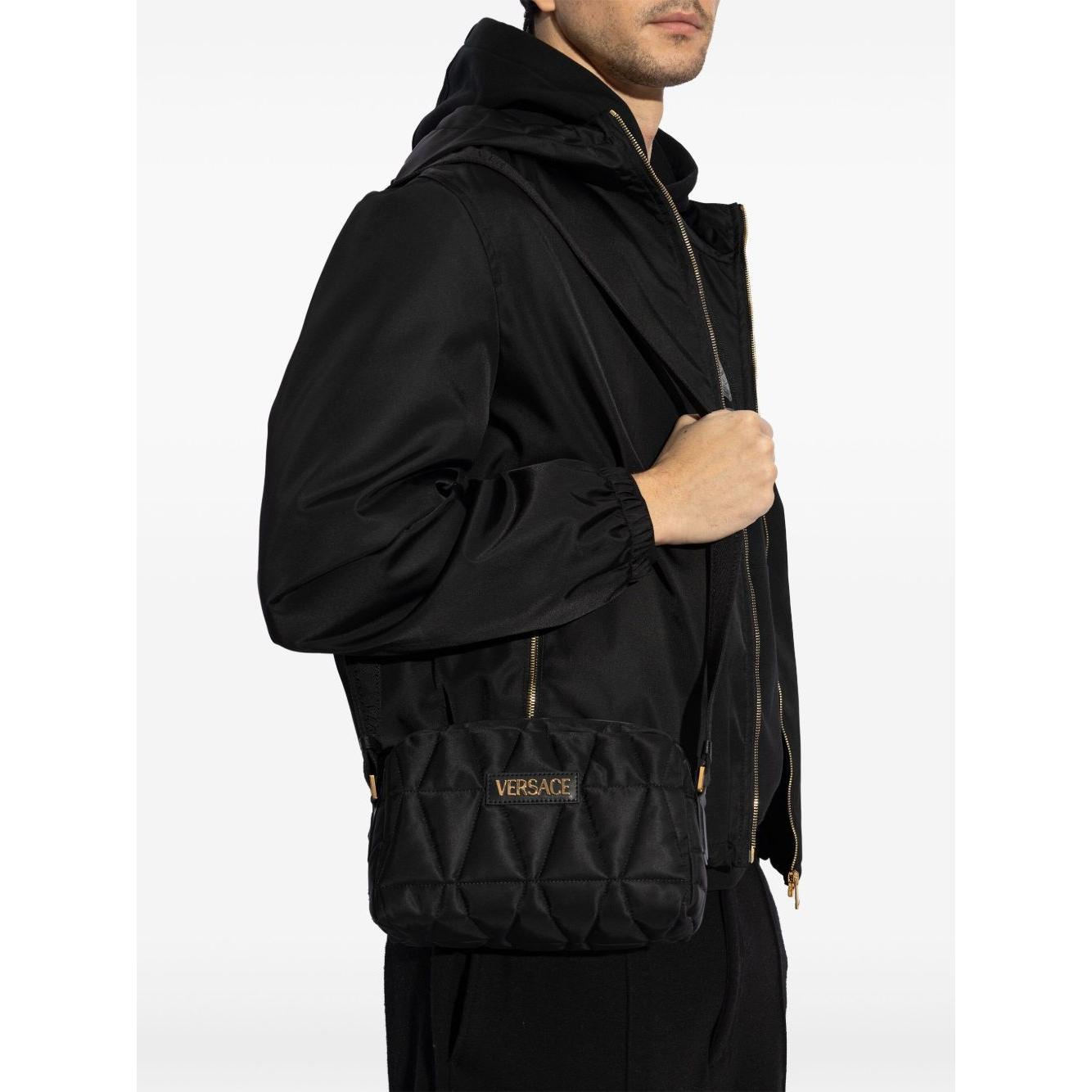 Front view with bag zipped and handles upright.