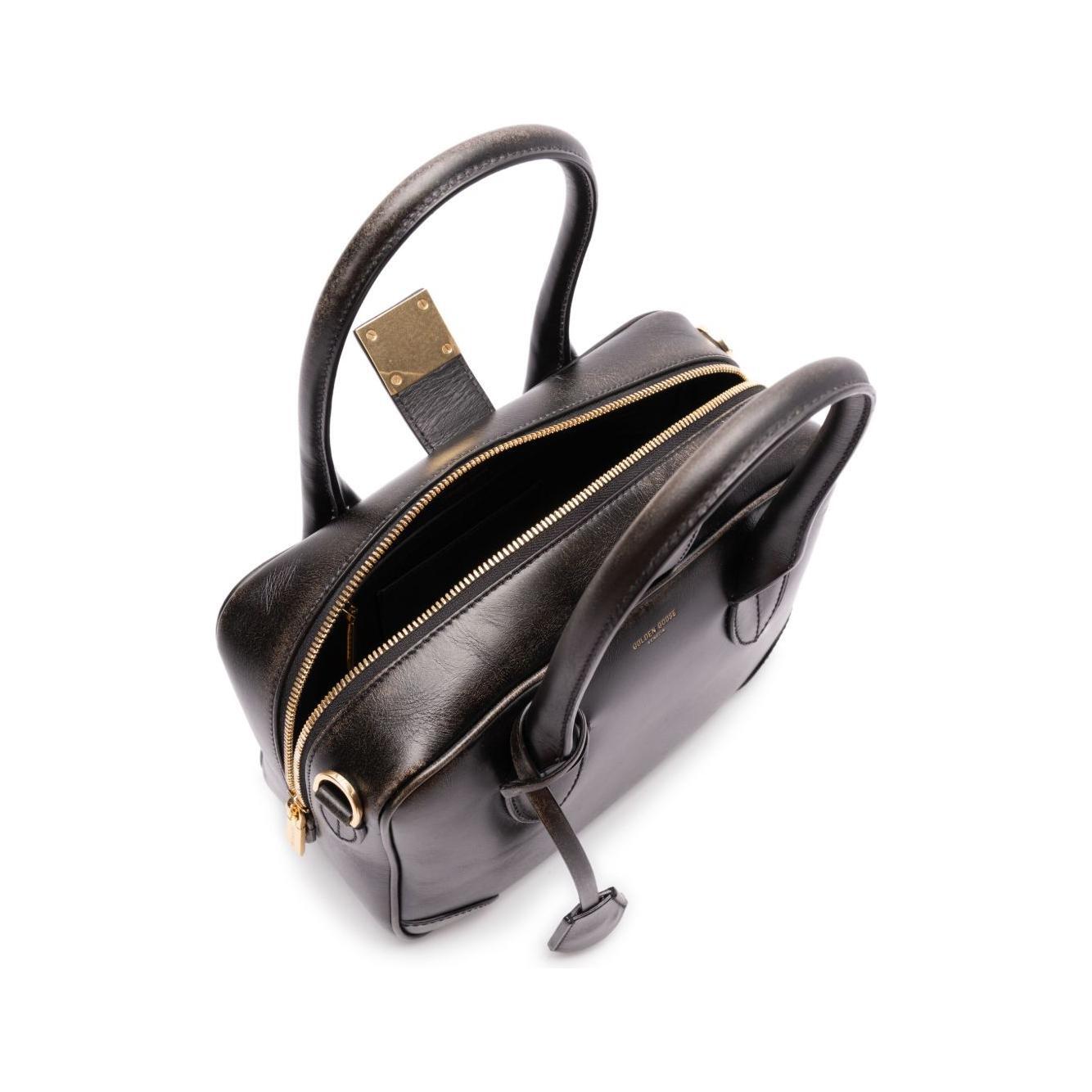 Front view with bag zipped and handles upright.