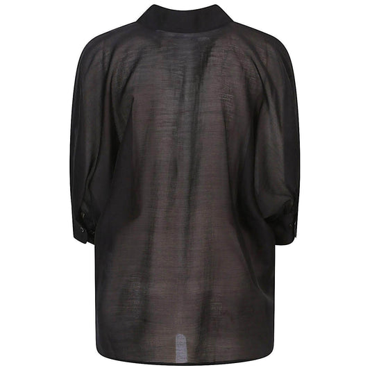 Back view of women's black oversized SOSUE Antonia blouse with short sleeves and smooth button placket, crafted from soft fabric.