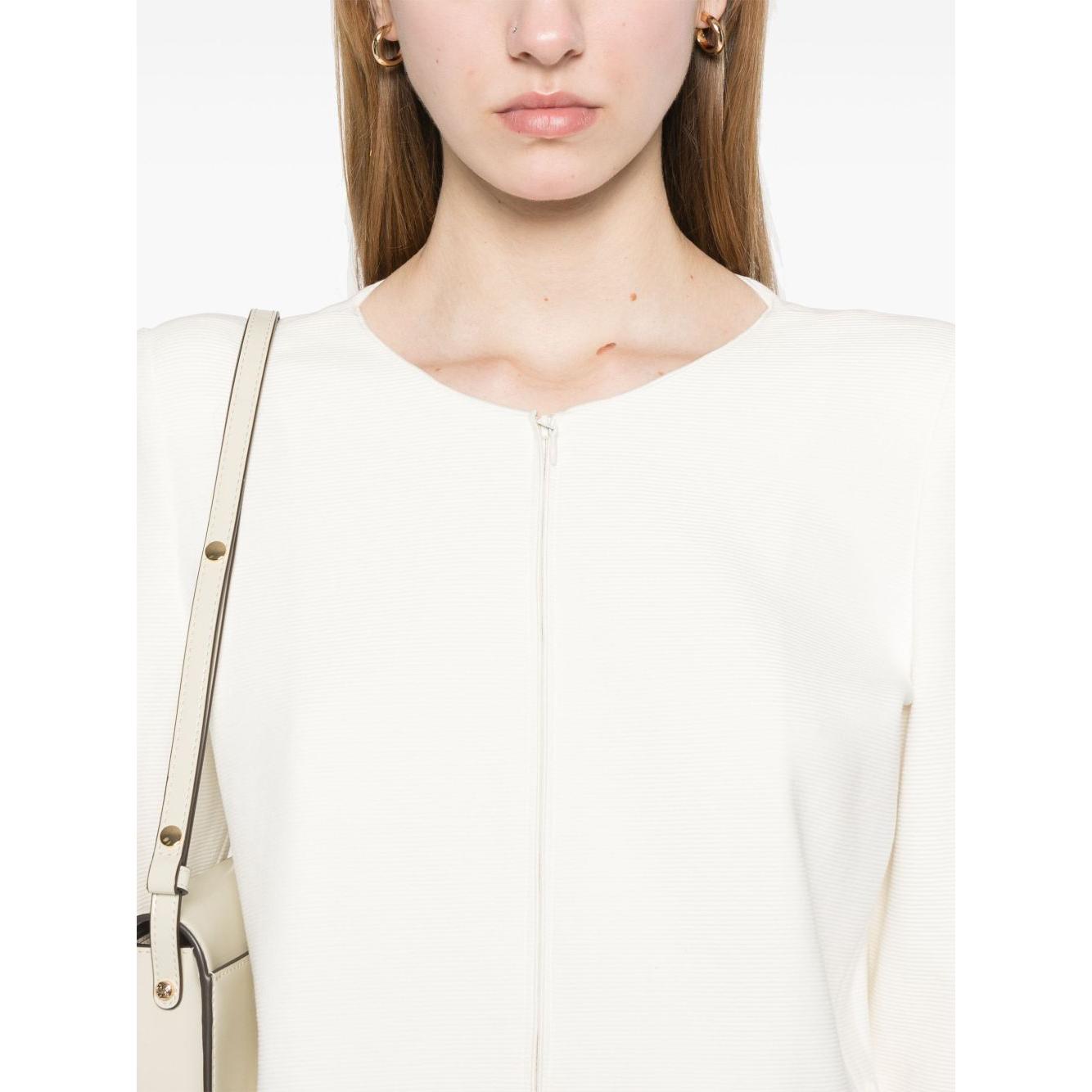 Front view with bag zipped and handles upright.