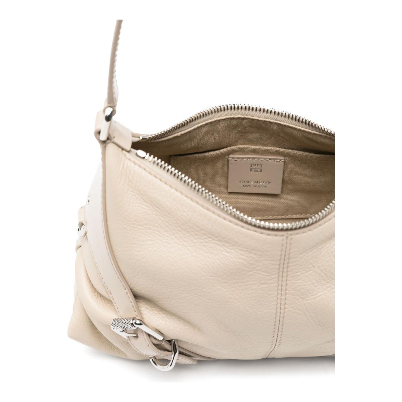 Front view with bag zipped and handles upright.