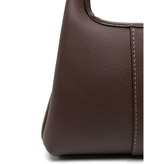 Zoomed view of coffee brown Coach Lana 25 leather crossbody bag, showcasing textured leather with detailed stitching.