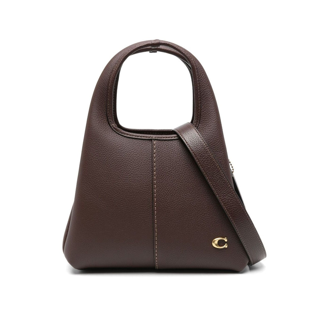 Coach Lana 25 leather crossbody bag in coffee brown with two top handles, adjustable detachable strap, and included dust bag.