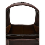 Interior view of Coach Lana 25 leather crossbody bag in coffee brown, showing open top and spacious interior.