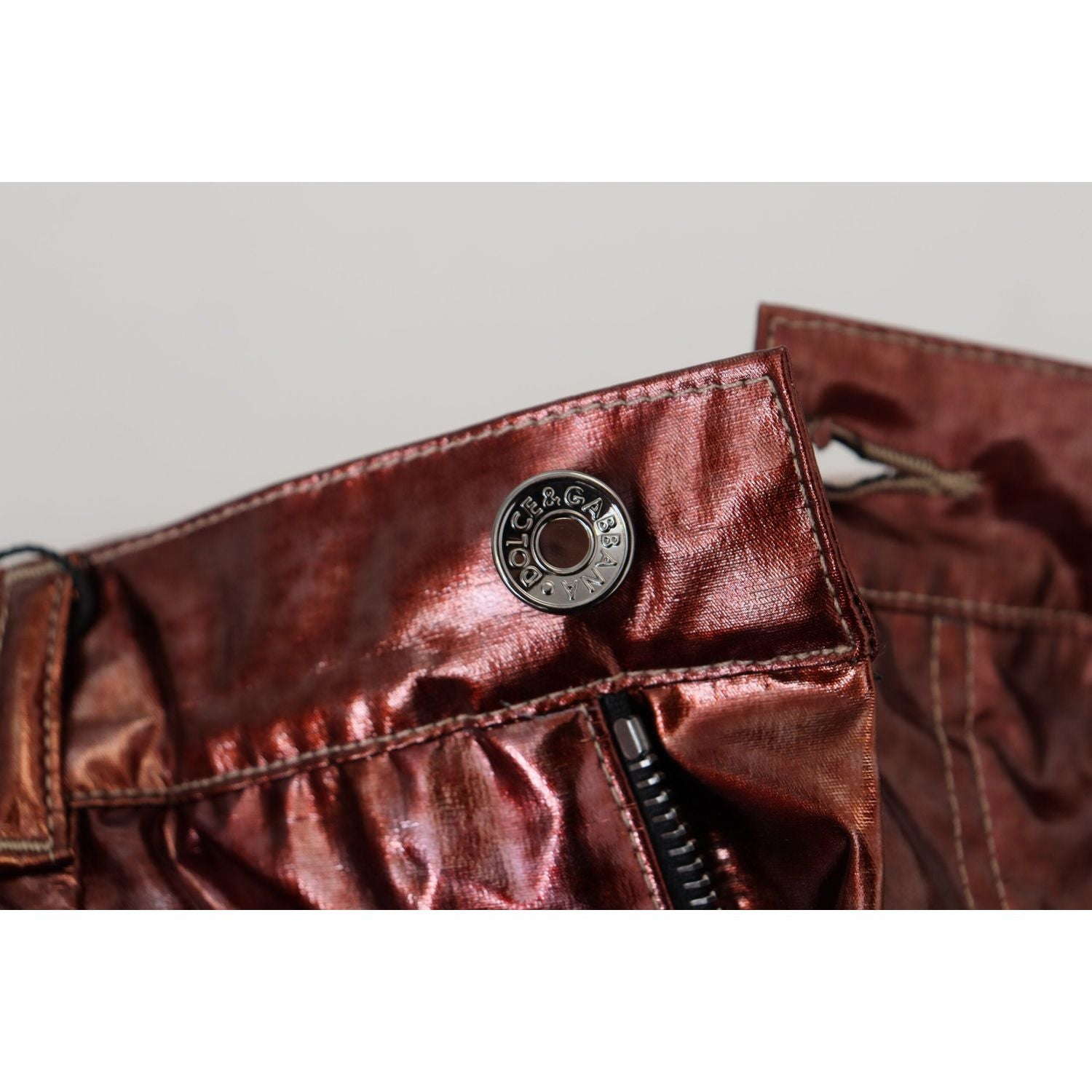 بنطلون جينز ضيق بخصر مرتفع من دولتشي آند غابانا باللون البرونزي المعدني