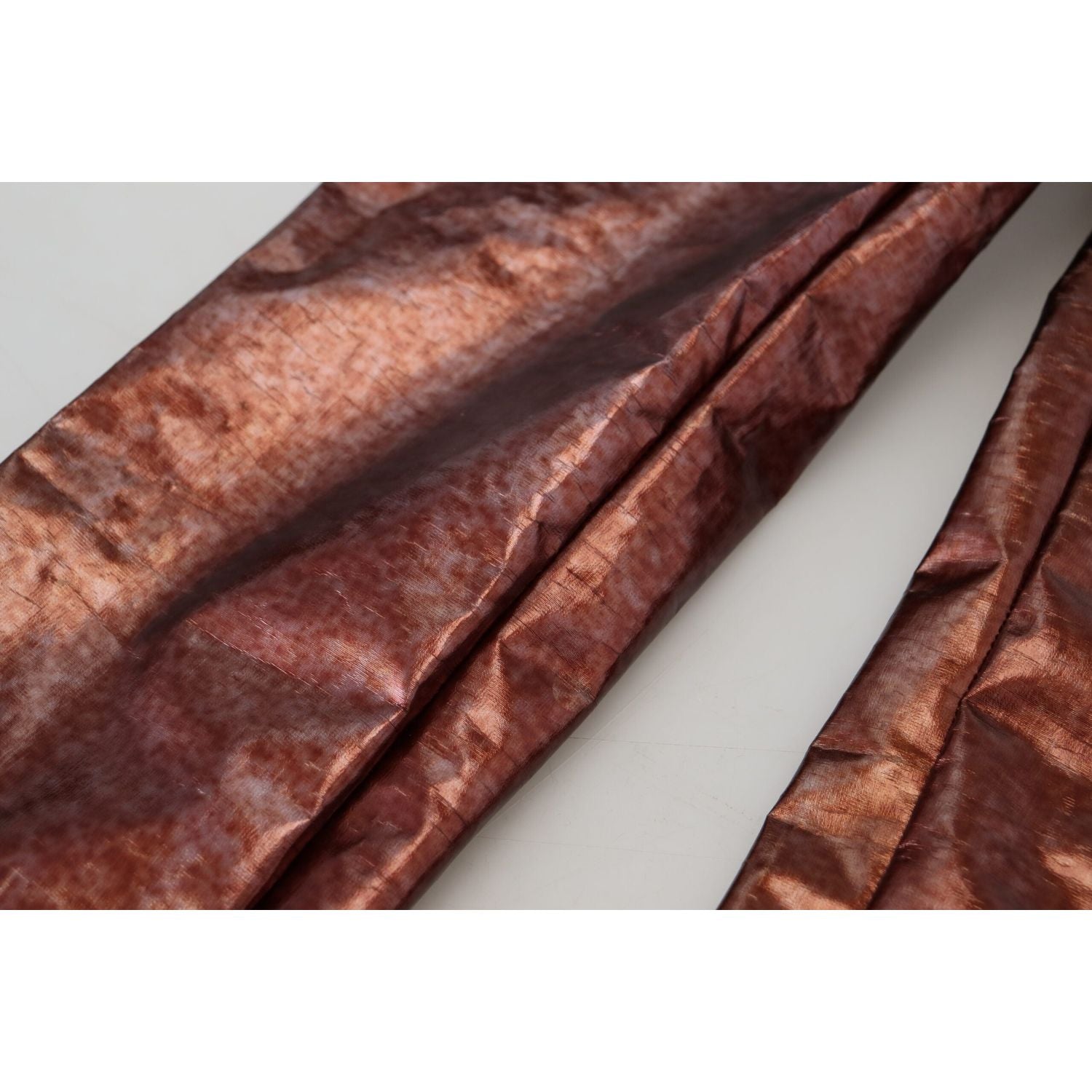 بنطلون جينز ضيق بخصر مرتفع من دولتشي آند غابانا باللون البرونزي المعدني