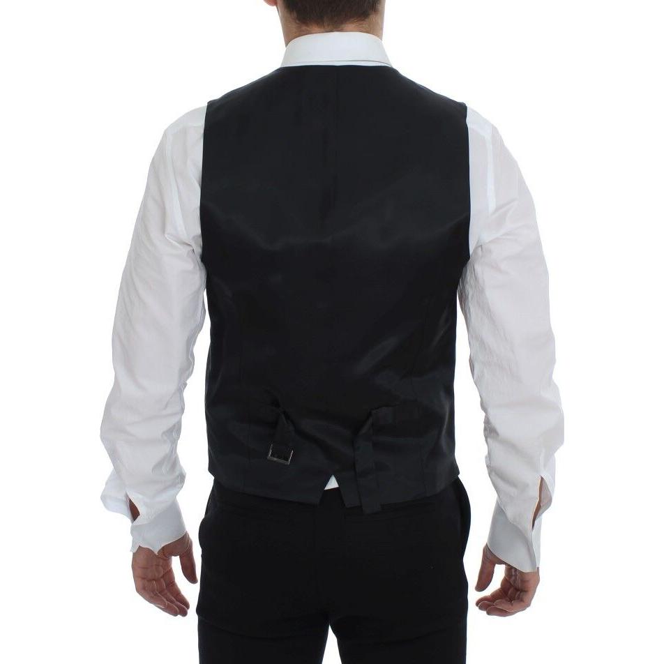 فستان من الصوف المخطط باللون الأسود من دولتشي آند غابانا