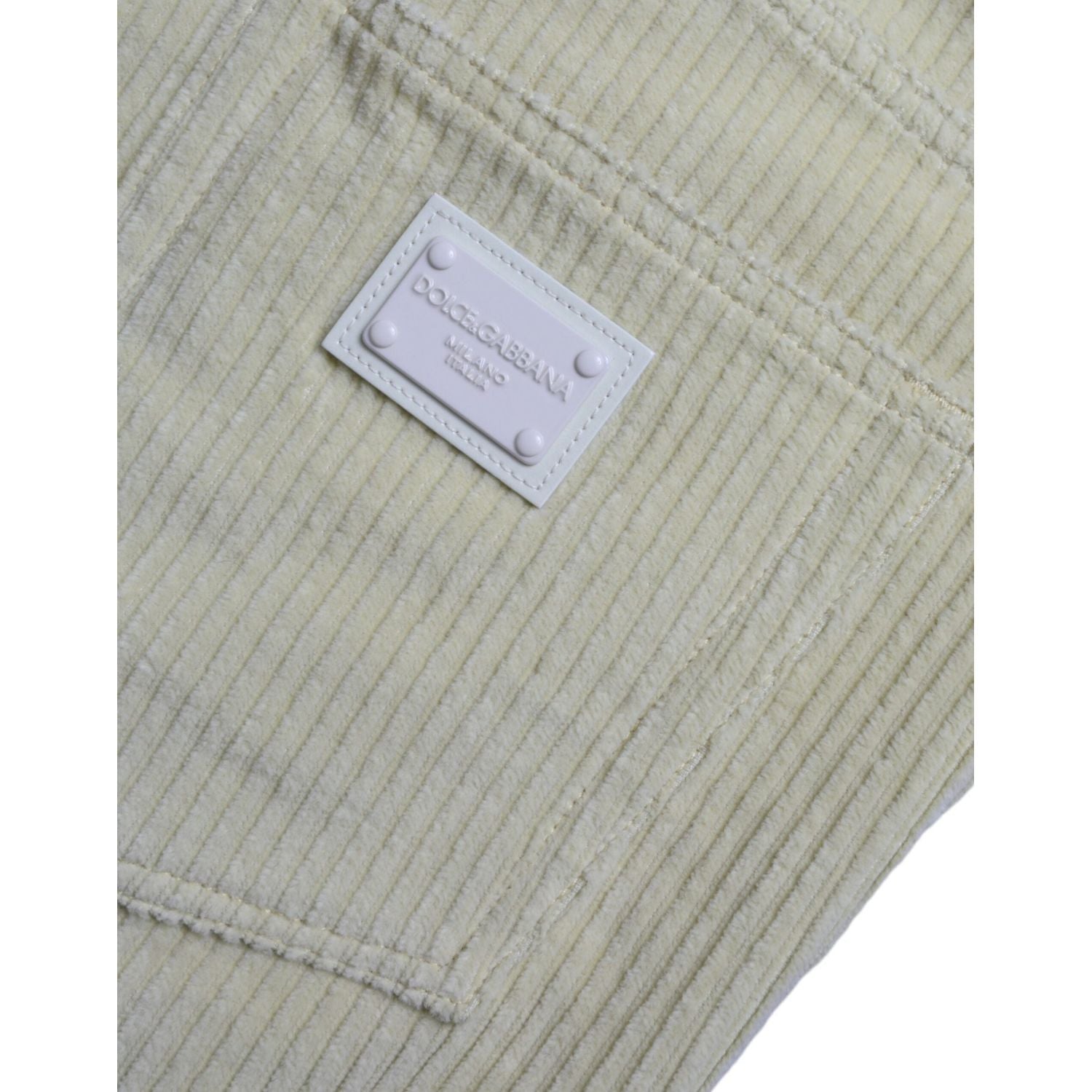 黄色灯芯绒徽标牌紧身牛仔裤