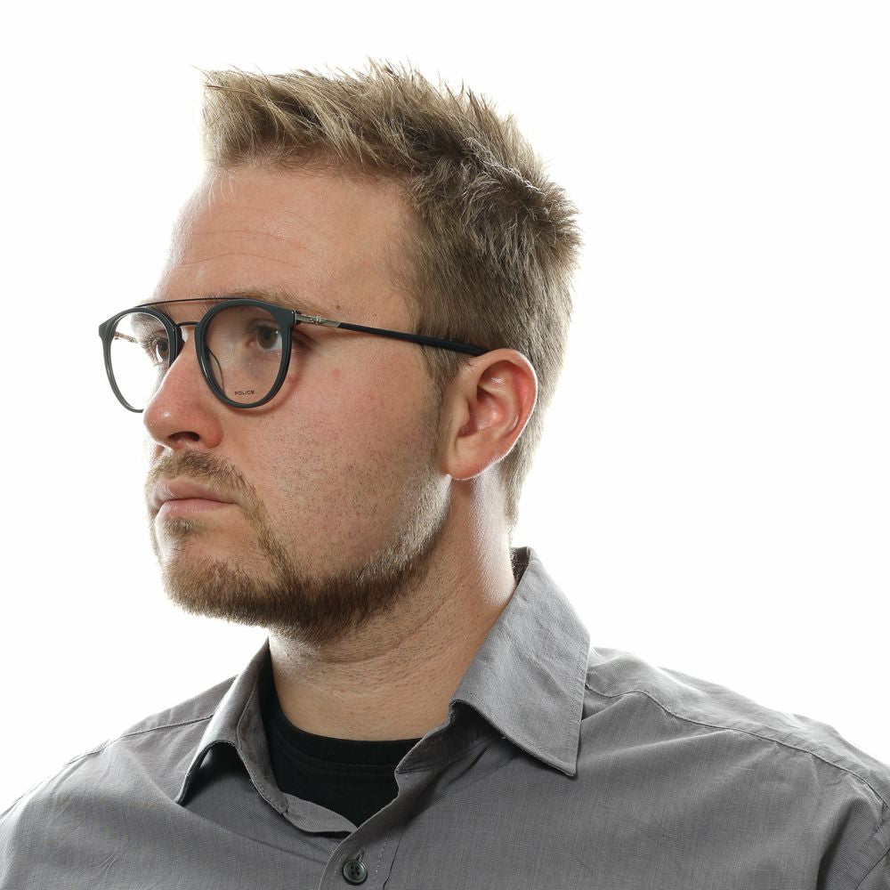Man wearing Police Gray Men Glasses Frame, full-rim style, with metal and plastic material, in a grey shirt.