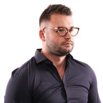 Person wearing Lozza Multicolor Unisex Glasses Frame with metal and plastic material, showcasing a stylish, full-rim design.