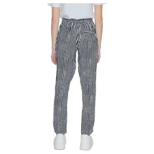 Women's black and white viscose pants, regular fit, spring/summer collection, back view with zipper detail, 100% viscose fabric.
