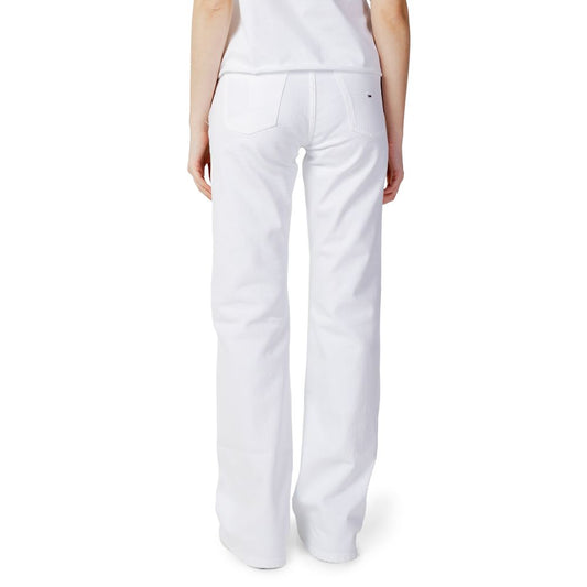 Woman wearing Tommy Hilfiger slim fit white jeans made of cotton and elastane, showcasing back view fashion style.